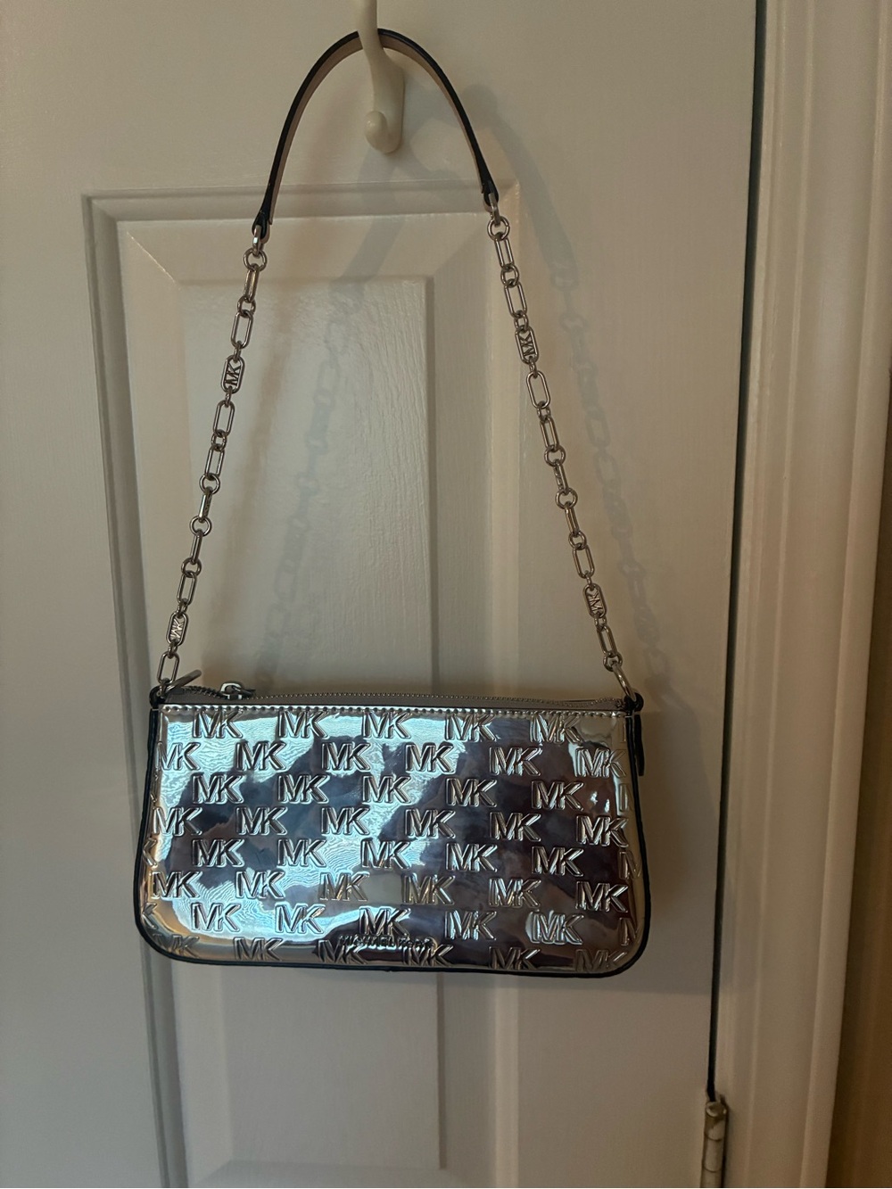 Brand new Michael Kors Silver MK Embossed Chain Shoulder Bag